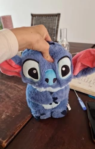 How do I care for a breathing stitch toy?